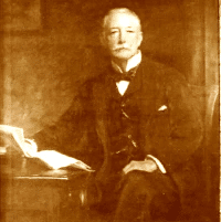 Picture of man sat at a desk